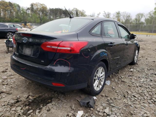 Photo 4 from auction – 2015 FORD FOCUS SE with VIN 1FADP3F20FL303980
