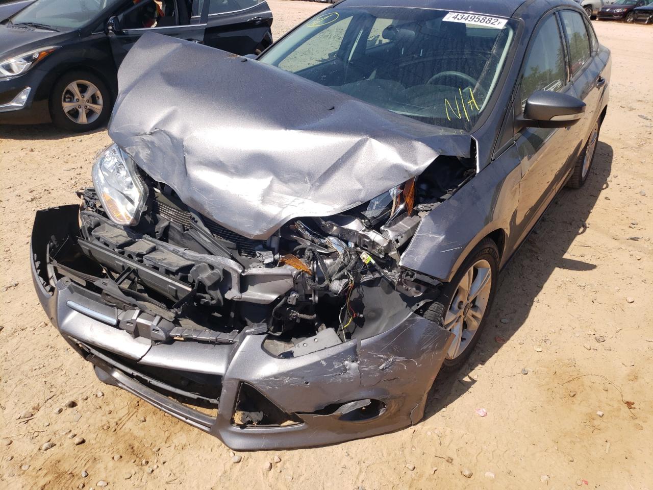 Photo 9 from auction – 2014 FORD FOCUS SE with VIN 1FADP3F22EL379022