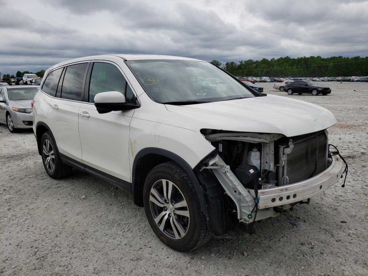 HONDA PILOT EXL 2018 with VIN 5FNYF5H55JB007219 - Photo from auction