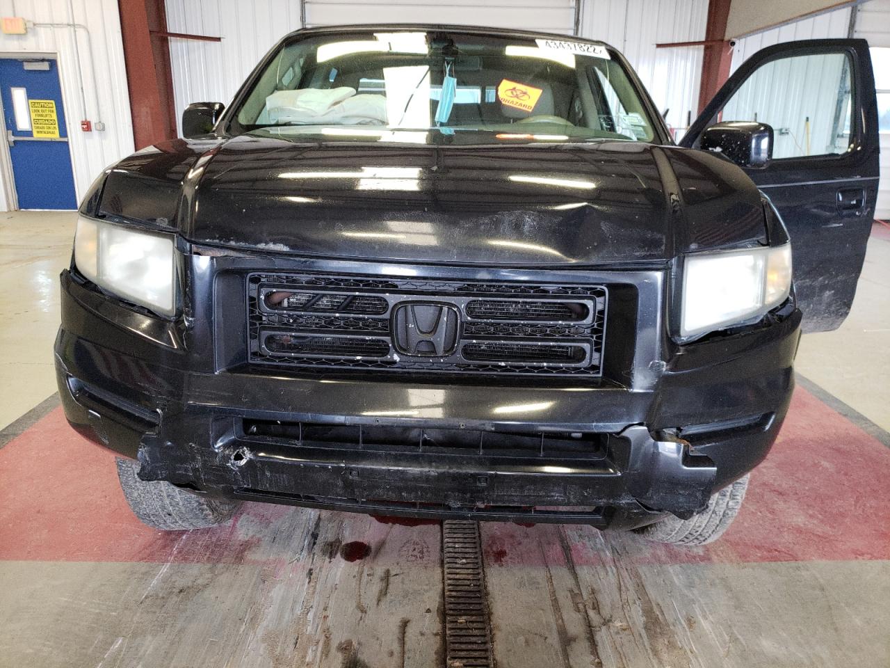 Photo 7 from auction – 2006 HONDA RIDGELINE with VIN 2HJYK16506H545783