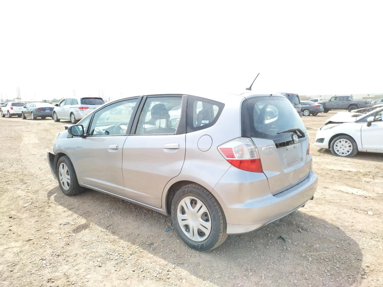 Photo 3 from auction – 2009 HONDA FIT with VIN JHMGE882X9S025007