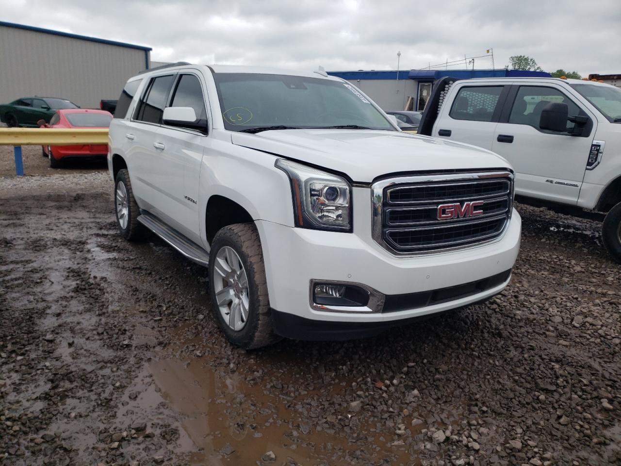GMC YUKON SLT 2015 with VIN 1GKS2BKC3FR564384 - Photo from auction