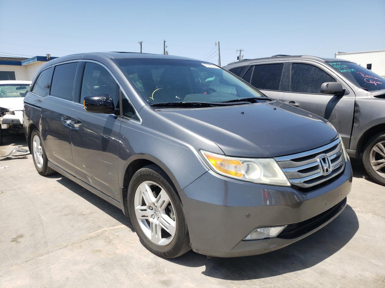 Photo 1 from auction – 2011 HONDA ODYSSEY TO with VIN 5FNRL5H96BB076146