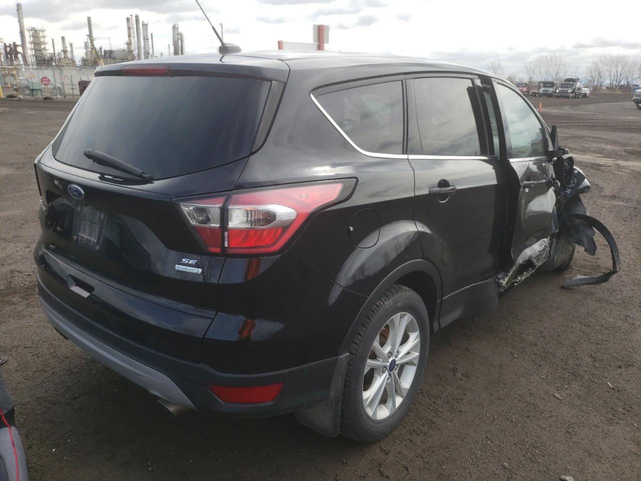 Photo 4 from auction – 2017 FORD ESCAPE SE with VIN 1FMCU0G9XHUB69464