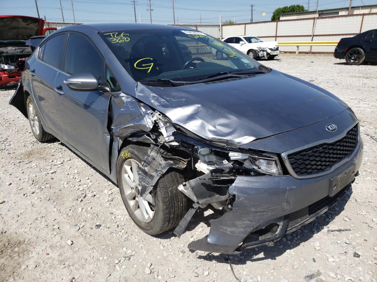 Photo 11 from auction – 2017 KIA FORTE LX with VIN 3KPFL4A7XHE022370