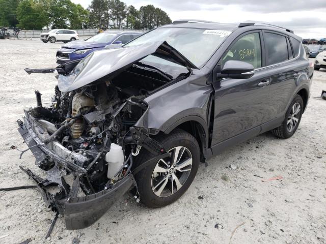 Photo 2 from auction – 2017 TOYOTA RAV4 XLE with VIN JTMWFREV5HJ133313