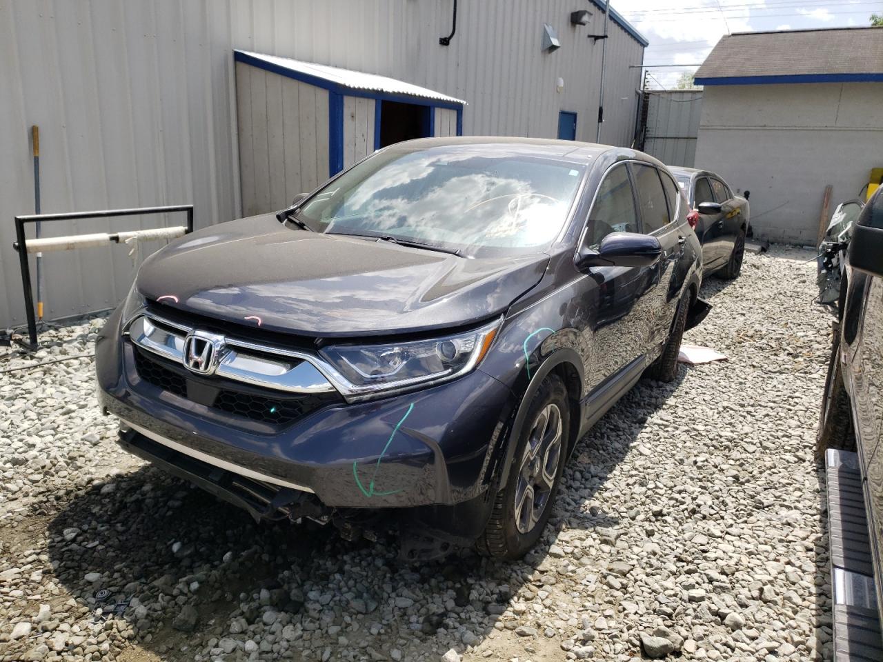 Photo 2 from auction – 2018 HONDA CR-V EX with VIN 7FARW1H59JE030651