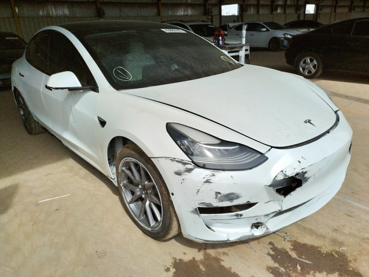 TESLA MODEL 3 2021 with VIN 5YJ3E1EA8MF928863 - Photo from auction