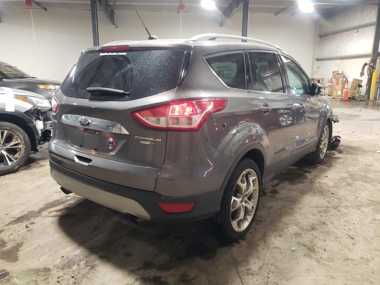 Photo 4 from auction – 2014 FORD ESCAPE TIT with VIN 1FMCU9JX7EUA90096