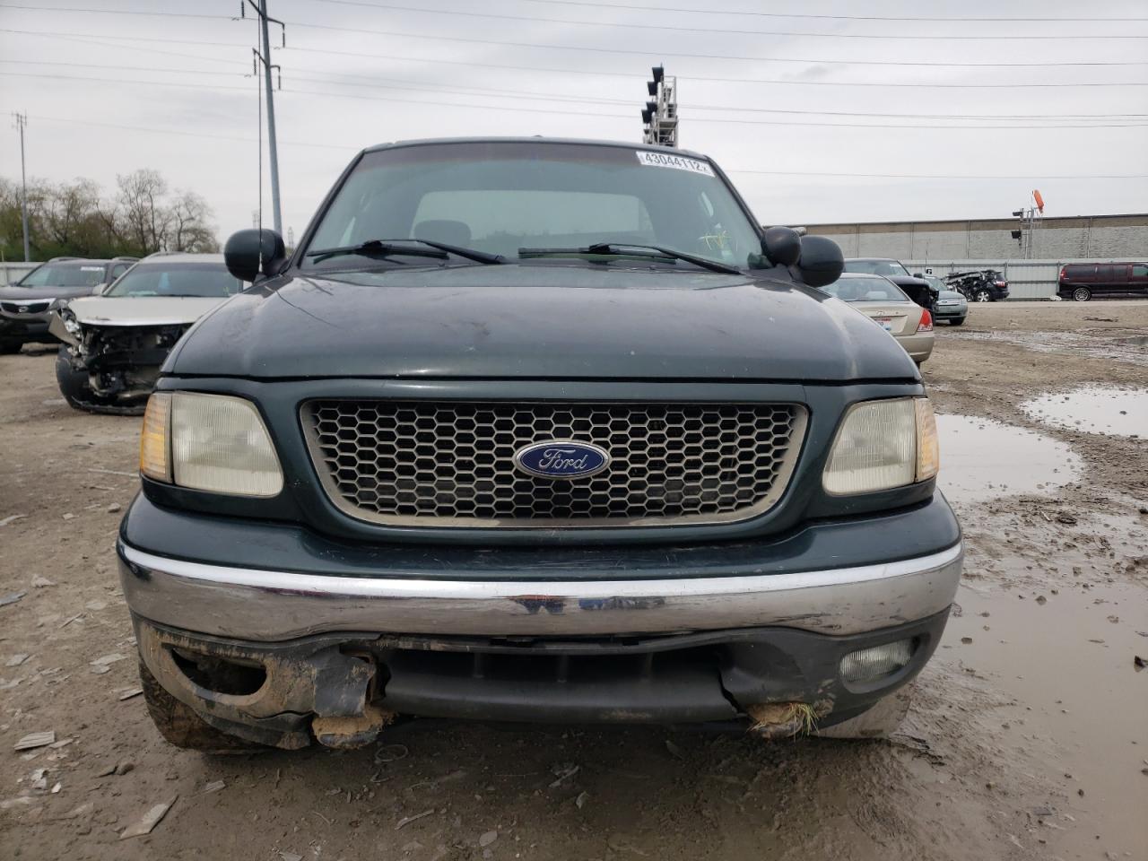 Photo 9 from auction – 2003 FORD F150 with VIN 2FTRX18L83CA67272