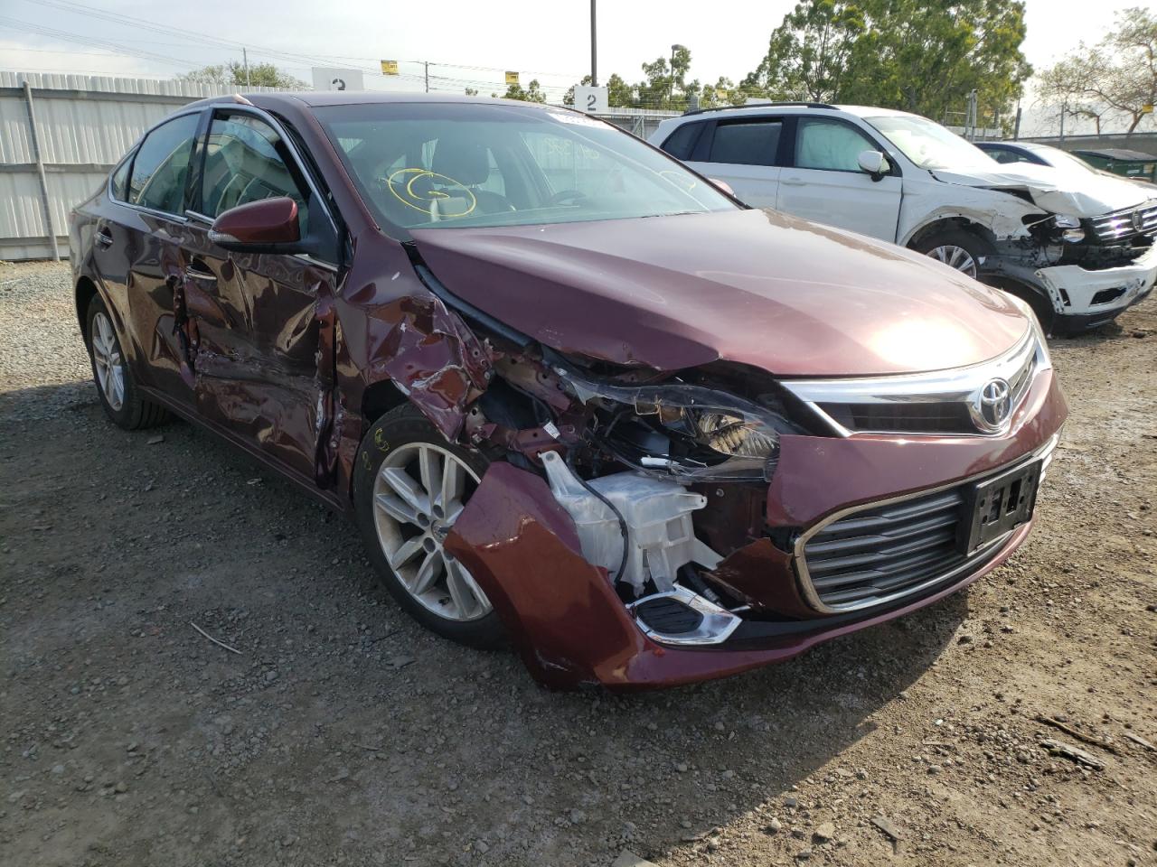 TOYOTA AVALON 2014 with VIN 4T1BK1EB4EU110032 - Photo from auction