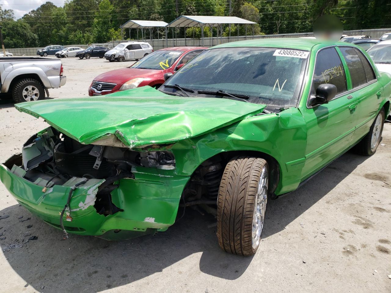 Photo 2 from auction – 2004 FORD CROWN VICT with VIN 2FAHP74W24X121695