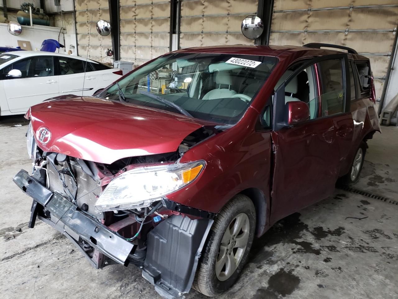 Photo 2 from auction – 2014 TOYOTA SIENNA LE with VIN 5TDKK3DC9ES447729