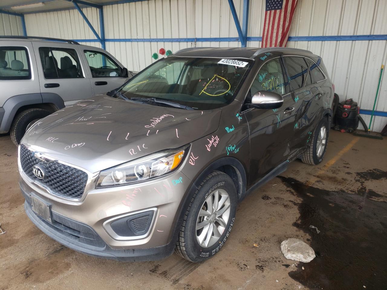 Photo 2 from auction – 2016 KIA SORENTO LX with VIN 5XYPG4A59GG014303