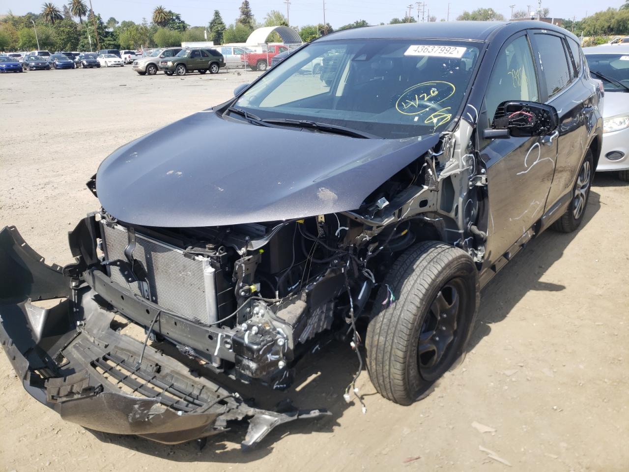 Photo 2 from auction – 2018 TOYOTA RAV4 LE with VIN JTMZFREV4JJ211485