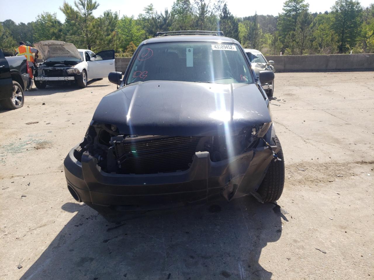 Photo 9 from auction – 2006 FORD ESCAPE XLT with VIN 1FMYU03186KA72231