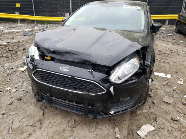 Photo 9 from auction – 2015 FORD FOCUS SE with VIN 1FADP3F20FL303980