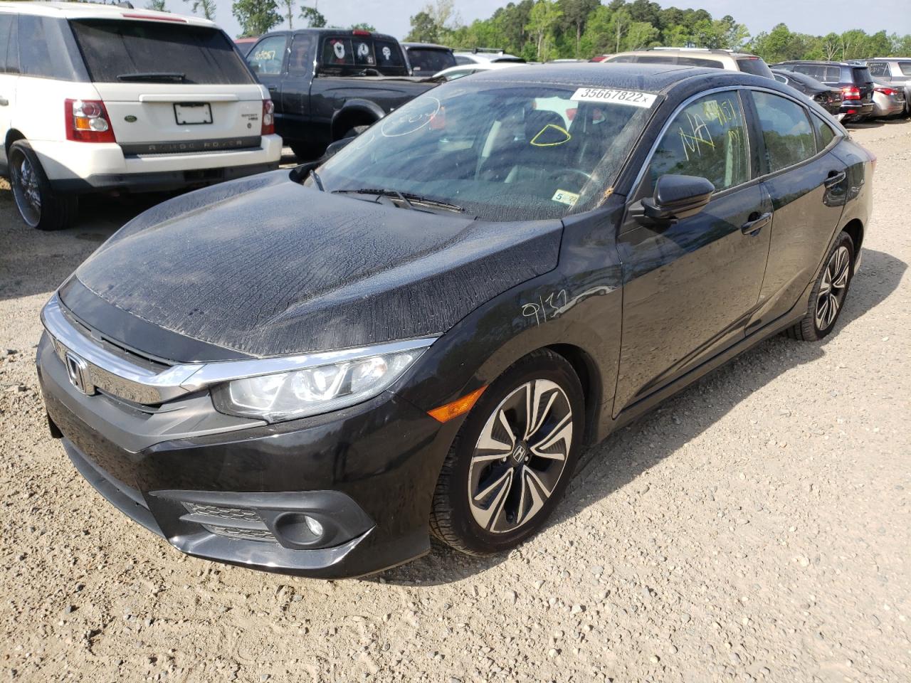 Photo 2 from auction – 2016 HONDA CIVIC EXL with VIN 2HGFC1F74GH636360