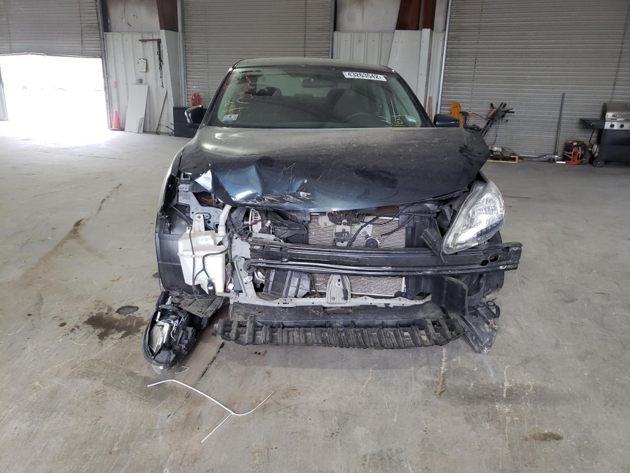 Photo 9 from auction – 2014 NISSAN SENTRA S with VIN 3N1AB7AP1EY265996