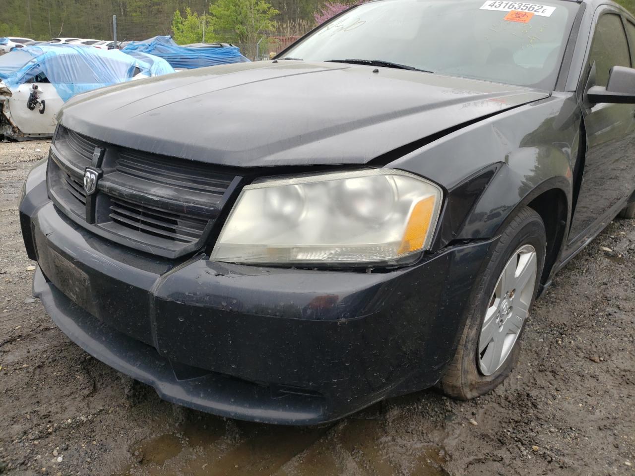 Photo 9 from auction – 2009 DODGE AVENGER SE with VIN 1B3LC46D09N559944