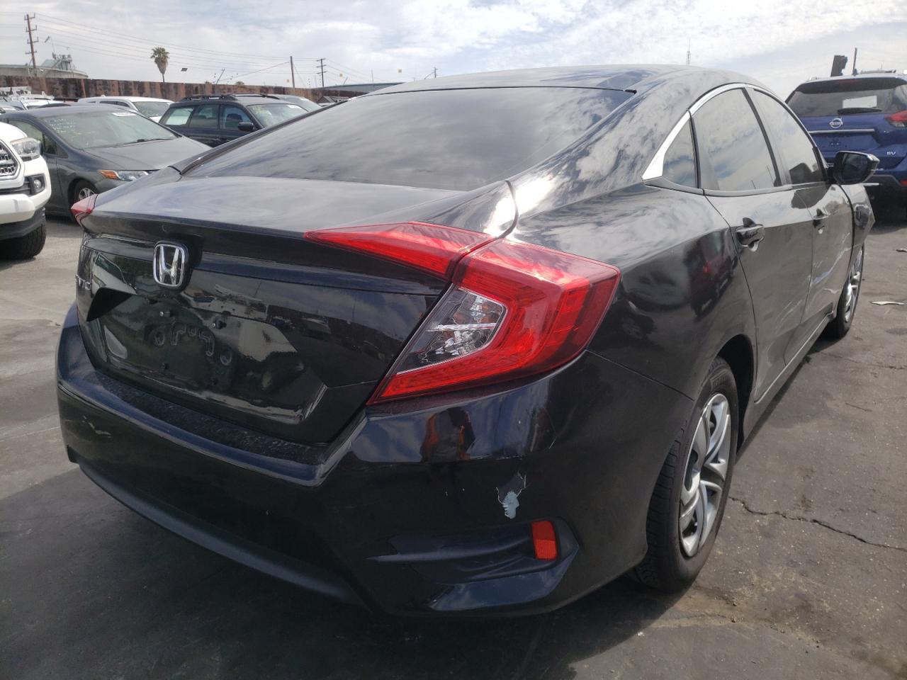 Photo 4 from auction – 2017 HONDA CIVIC LX with VIN 2HGFC2F54HH553887