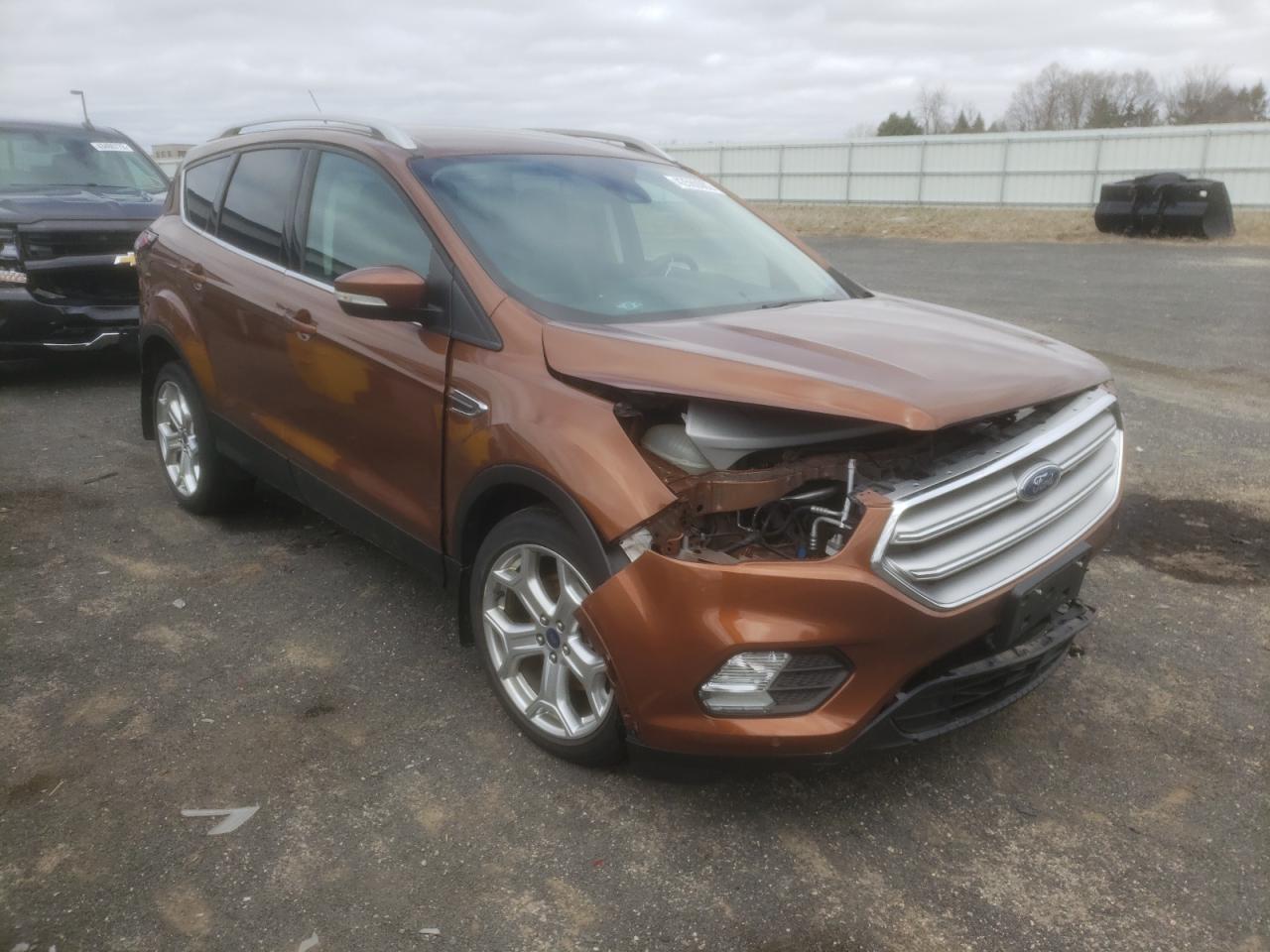 FORD ESCAPE TIT 2017 with VIN 1FMCU9J92HUB58147 - Photo from auction