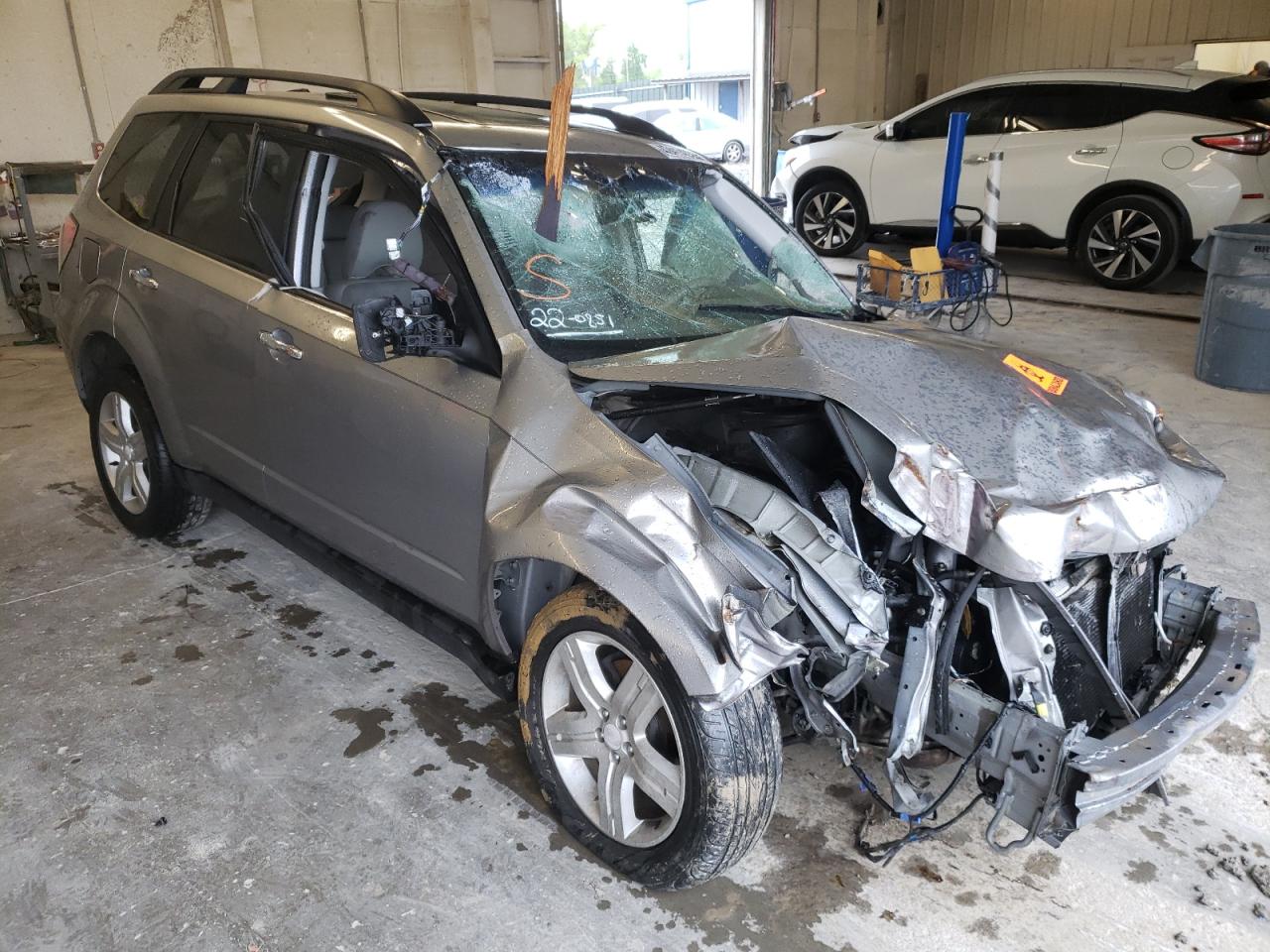 SUBARU FORESTER 2010 with VIN JF2SH6CC2AH774300 - Photo from auction