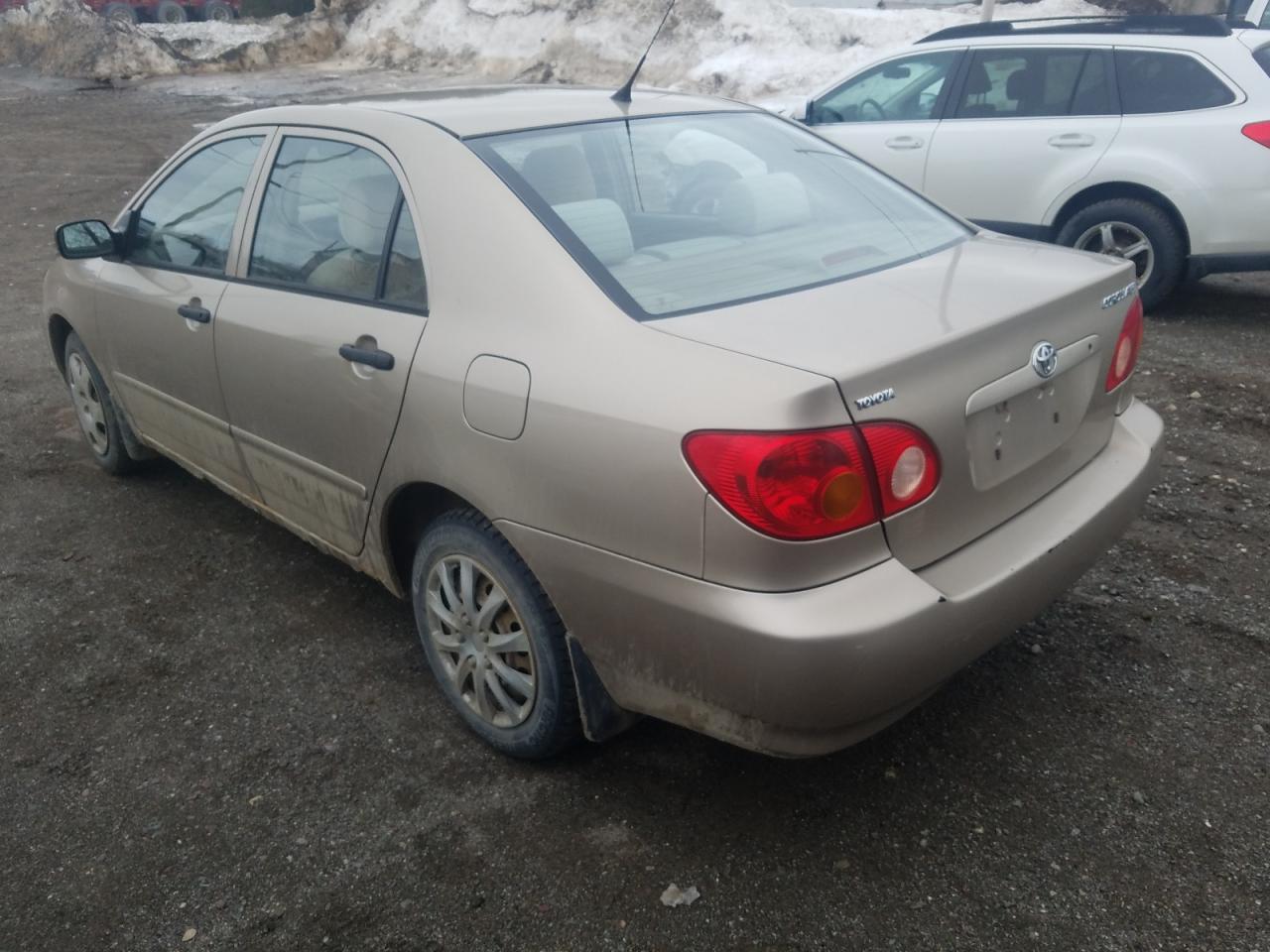 Photo 3 from auction – 2004 TOYOTA COROLLA CE with VIN 2T1BR32E04C809650