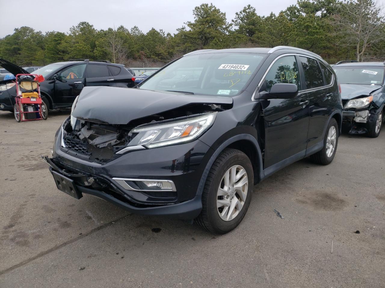 Photo 2 from auction – 2015 HONDA CR-V EXL with VIN 2HKRM4H79FH684112