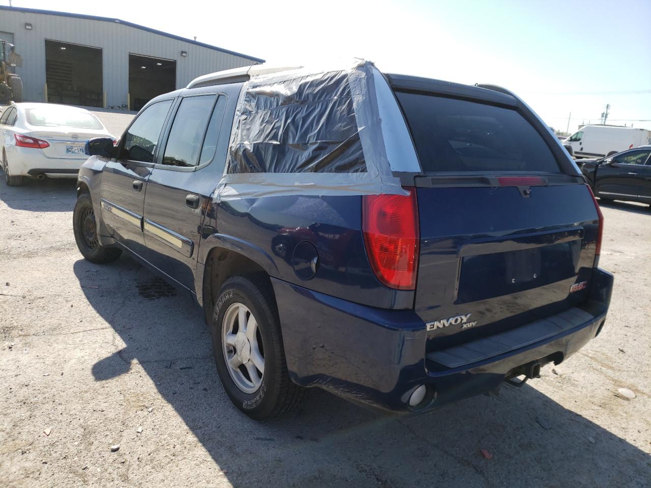 Photo 9 from auction – 2004 GMC ENVOY XUV with VIN 1GKES12S246185924