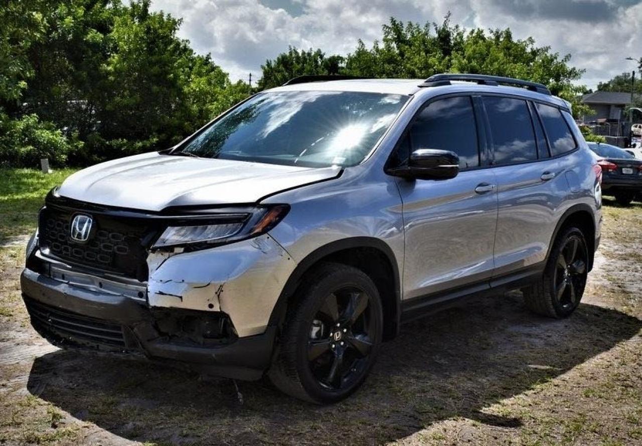 Photo 2 from auction – 2019 HONDA PASSPORT E with VIN 5FNYF8H01KB010190