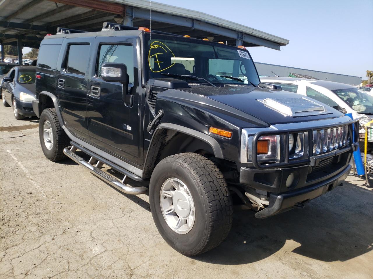 HUMMER H2 2006 with VIN 5GRGN23U66H104818 - Photo from auction