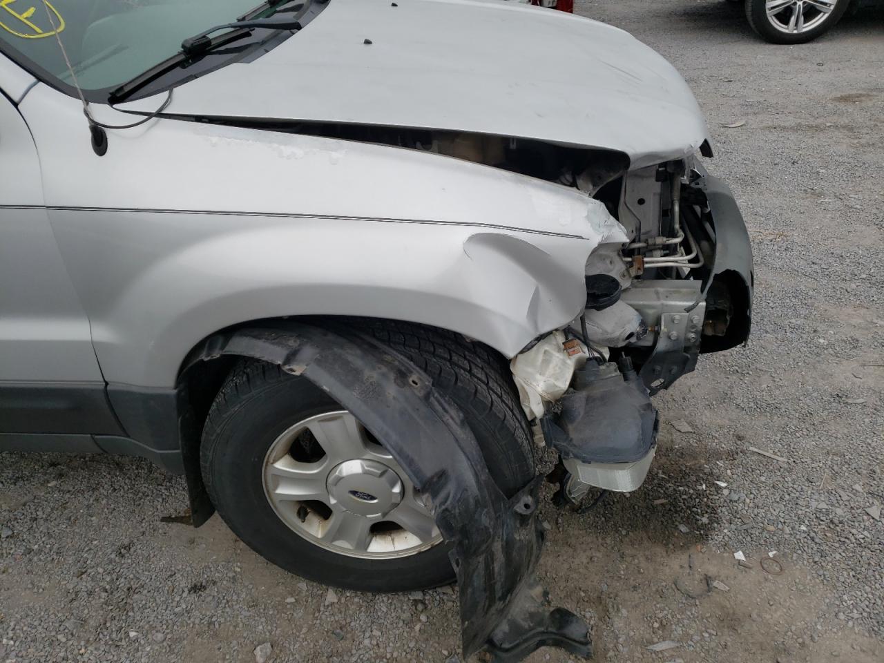 Photo 9 from auction – 2003 FORD ESCAPE XLT with VIN 1FMYU931X3KB34597