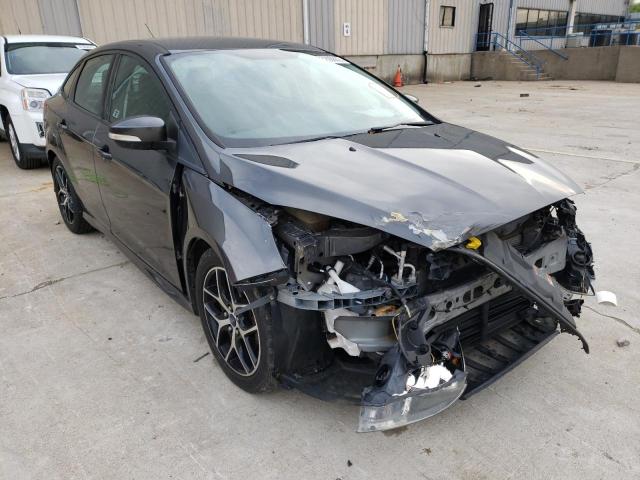 FORD FOCUS SE 2015 with VIN 1FADP3F23FL280310 - Photo from auction