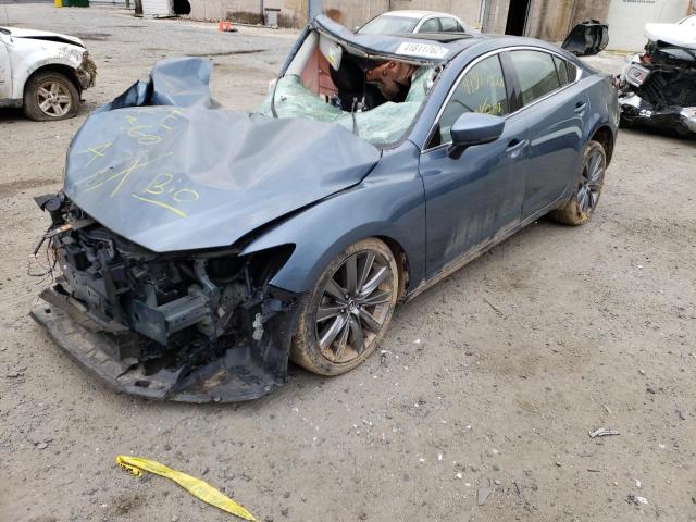Photo 2 from auction – 2018 MAZDA 6 TOURING with VIN JM1GL1VM8J1313963