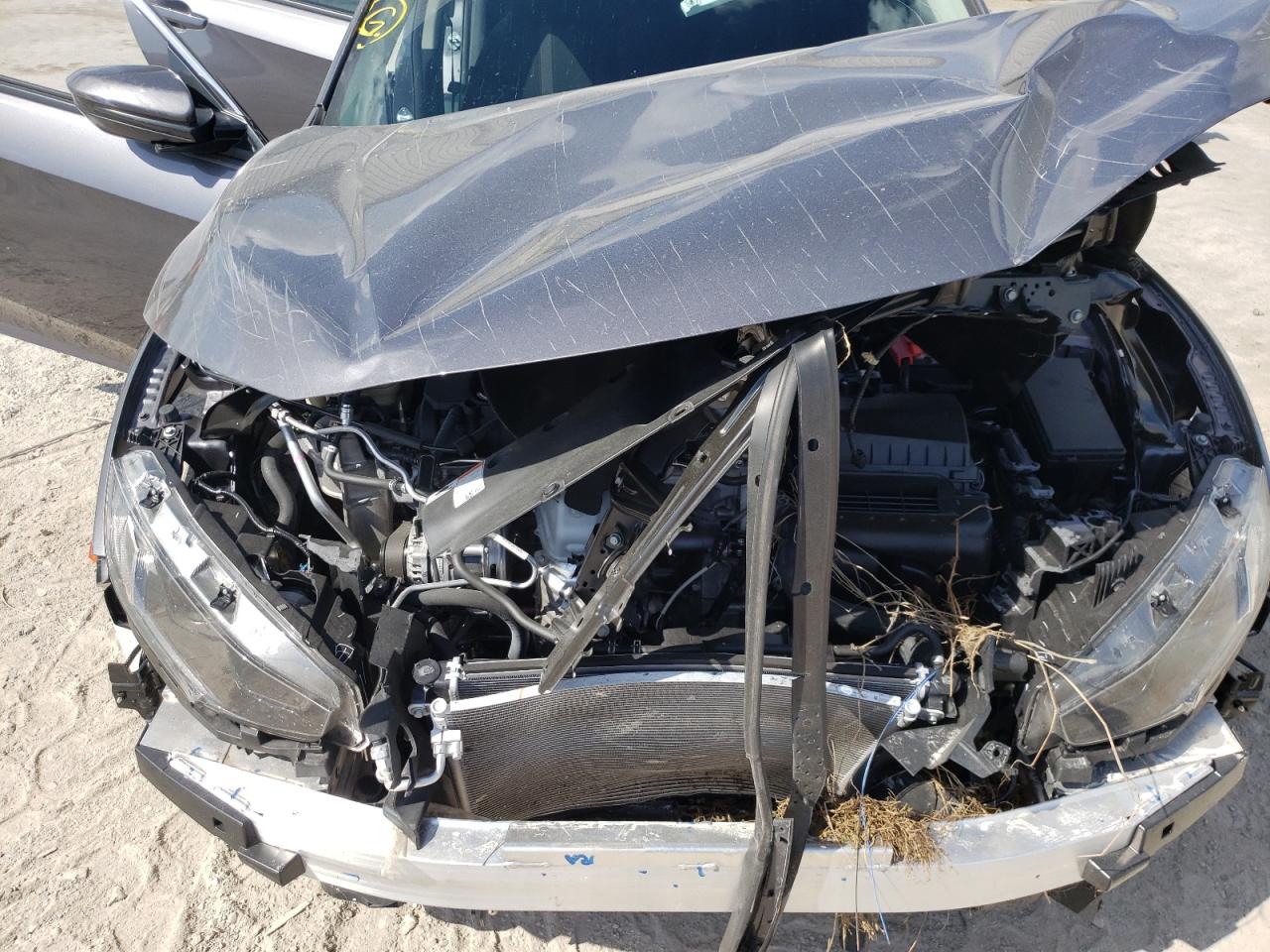 Photo 7 from auction – 2021 HONDA CIVIC LX with VIN 2HGFC2F6XMH551306