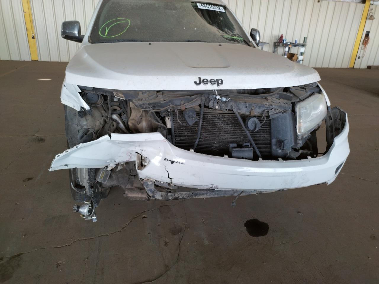 Photo 9 from auction – 2013 JEEP GRAND CHER with VIN 1C4RJECT4DC600726