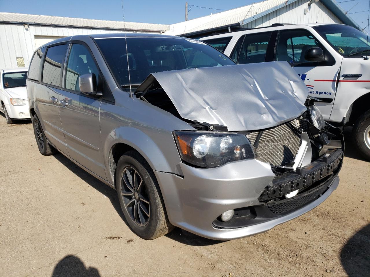 DODGE GRAND CARA 2015 with VIN 2C4RDGEG0FR667692 - Photo from auction