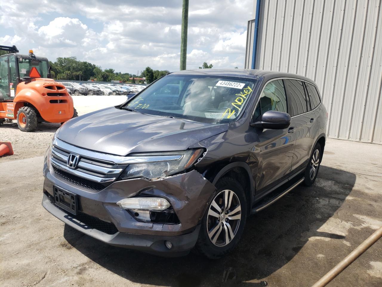 Photo 2 from auction – 2016 HONDA PILOT EXL with VIN 5FNYF5H53GB041877