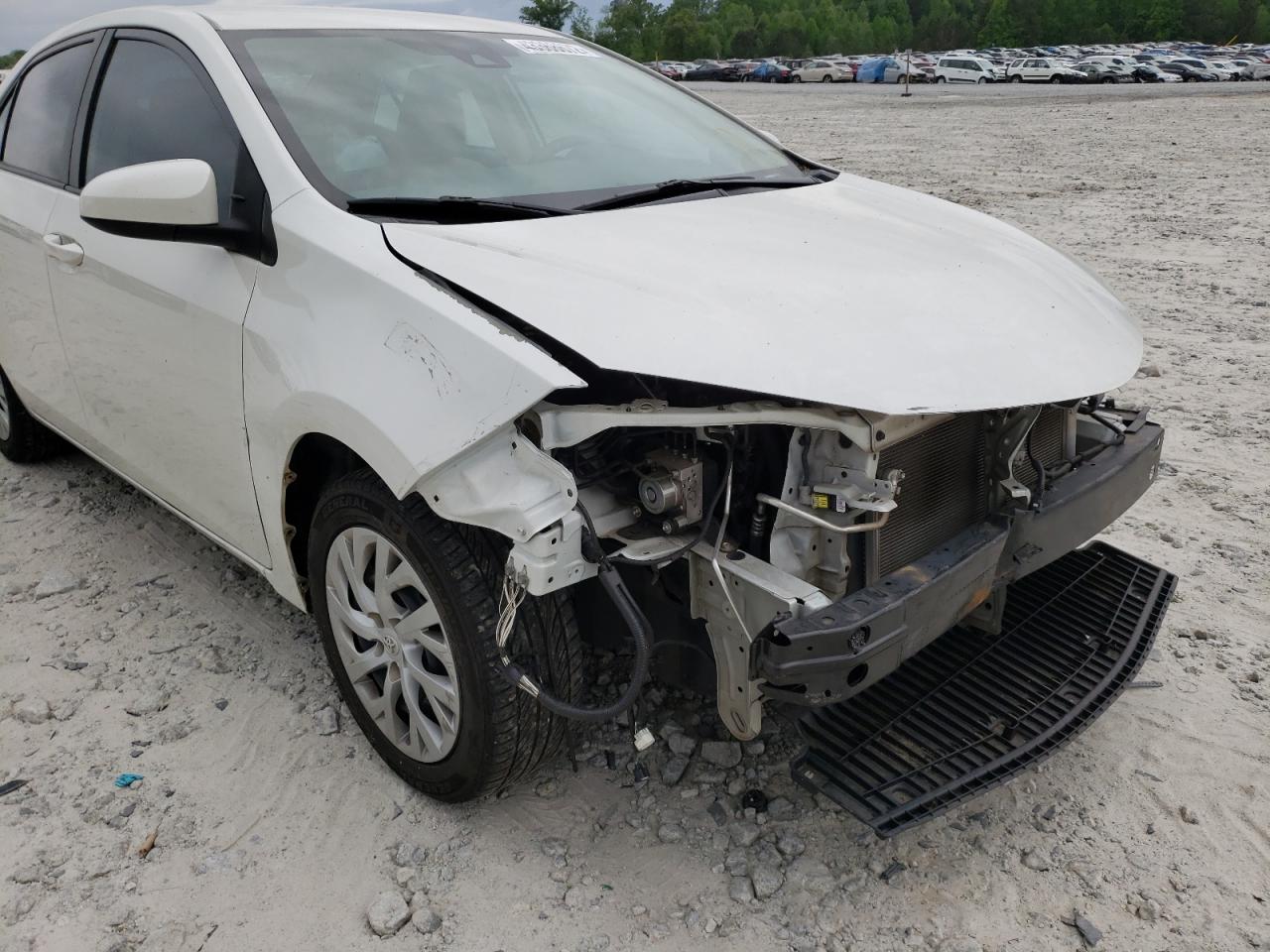 Photo 19 from auction – 2017 TOYOTA COROLLA L with VIN 5YFBURHE3HP694914