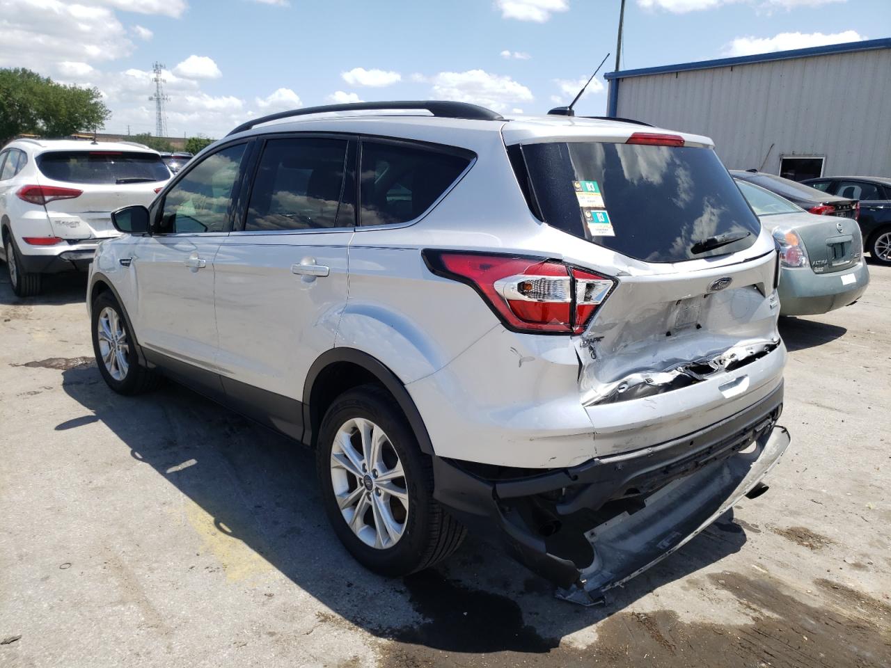 Photo 3 from auction – 2017 FORD ESCAPE SE with VIN 1FMCU0GD9HUC73156