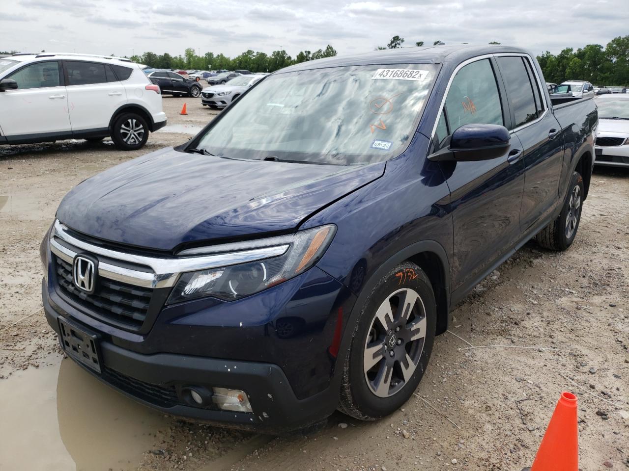 Photo 2 from auction – 2019 HONDA RIDGELINE with VIN 5FPYK2F55KB001202