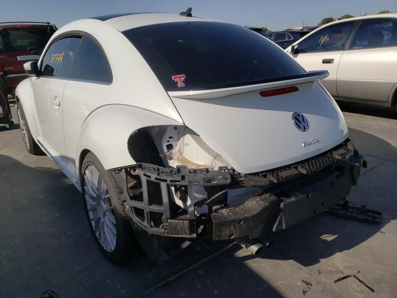 Photo 3 from auction – 2019 VOLKSWAGEN BEETLE S with VIN 3VWFD7AT7KM702250