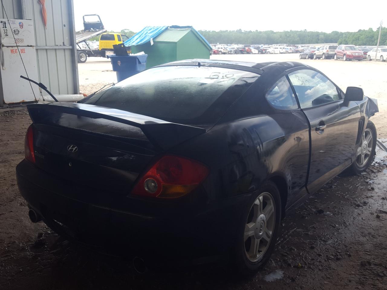 Photo 4 from auction – 2004 HYUNDAI TIBURON with VIN KMHHM65D14U140249