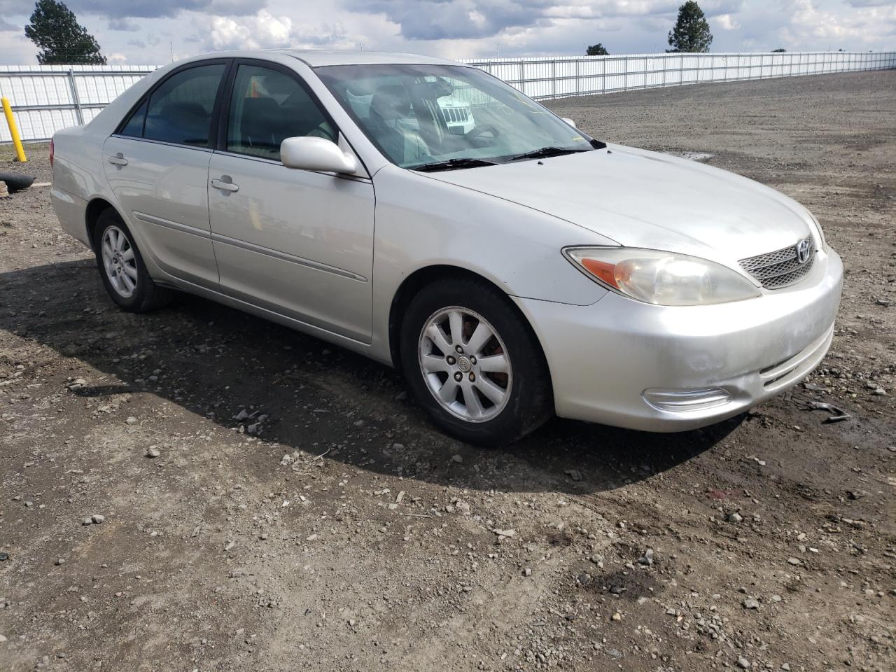 TOYOTA CAMRY LE 2002 with VIN 4T1BF30K92U001584 - Photo from auction