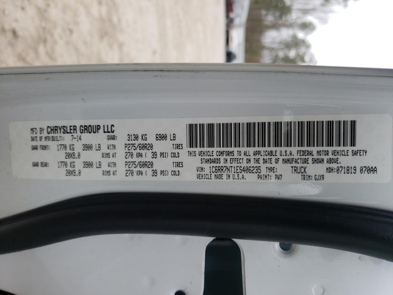 Photo 10 from auction – 2014 RAM 1500 LARAM with VIN 1C6RR7NT1ES406235