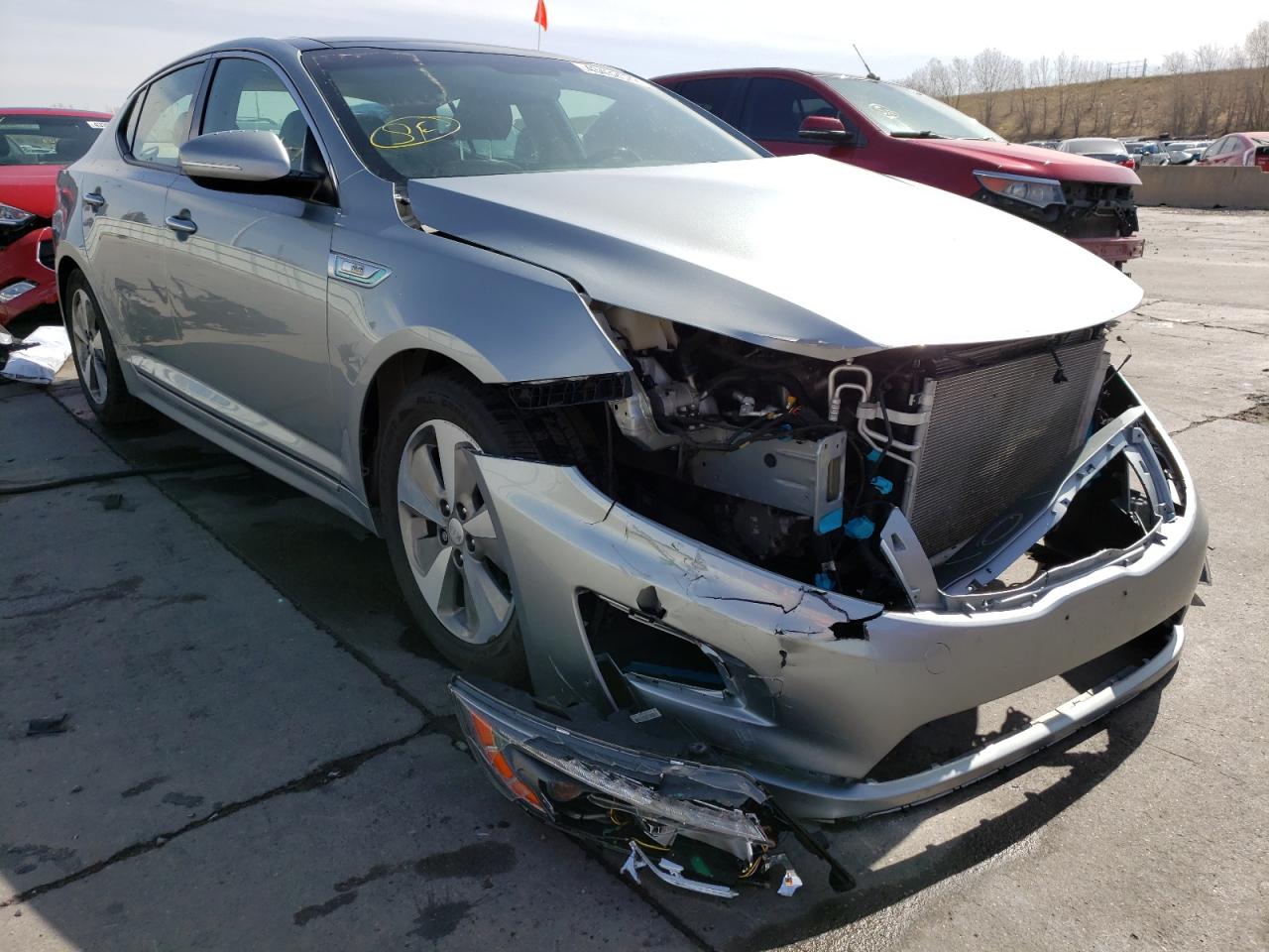 KIA OPTIMA HYB 2014 with VIN KNAGN4AD2E5067876 - Photo from auction