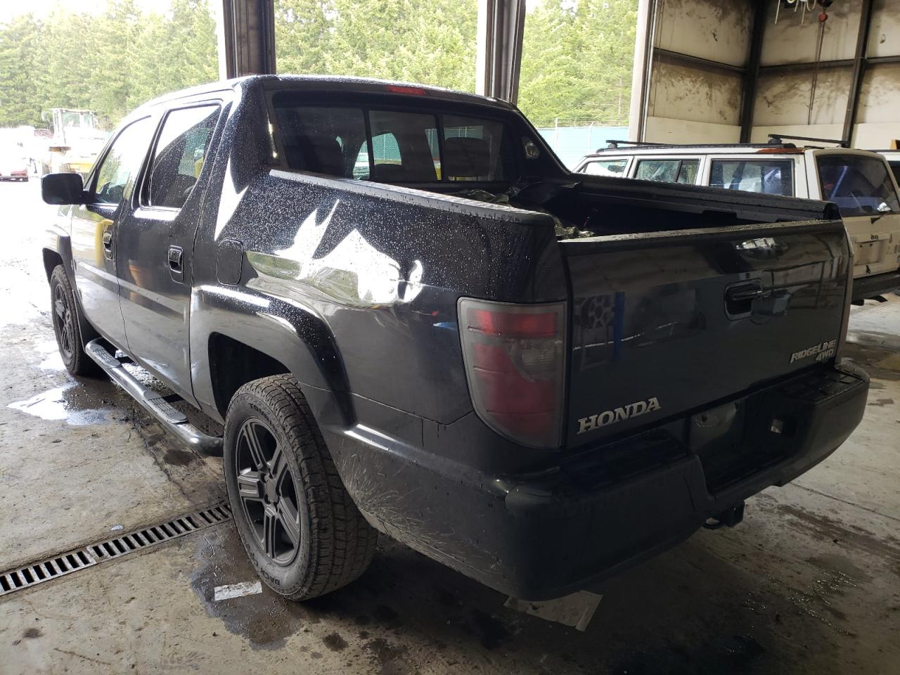Photo 3 from auction – 2013 HONDA RIDGELINE with VIN 5FPYK1F51DB012842