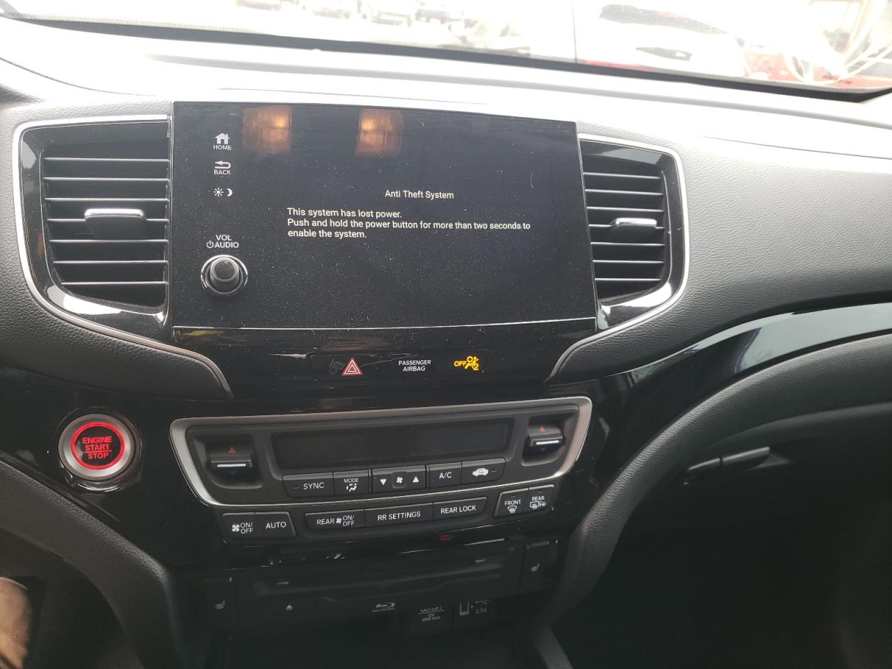 Photo 9 from auction – 2021 HONDA PILOT TOUR with VIN 5FNYF5H64MB011968