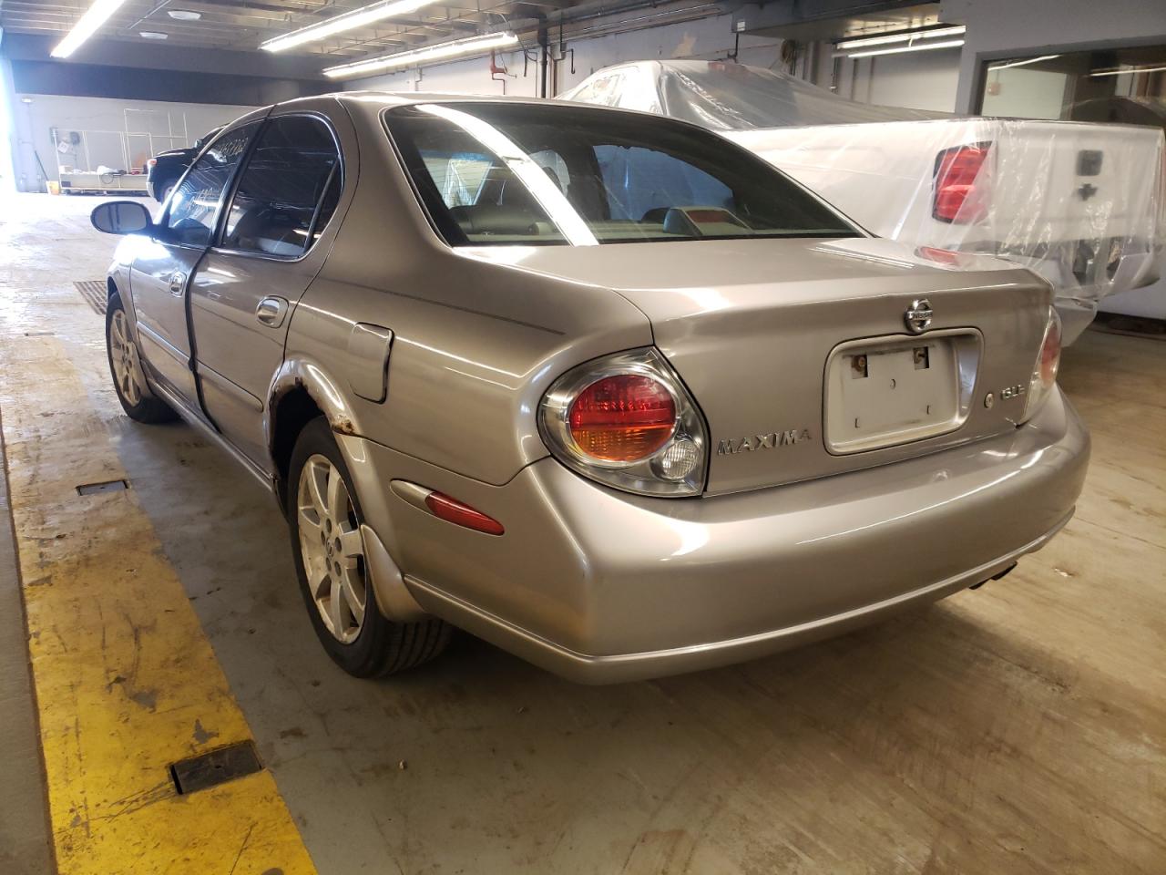 Photo 3 from auction – 2002 NISSAN MAXIMA GLE with VIN JN1DA31AX2T322883